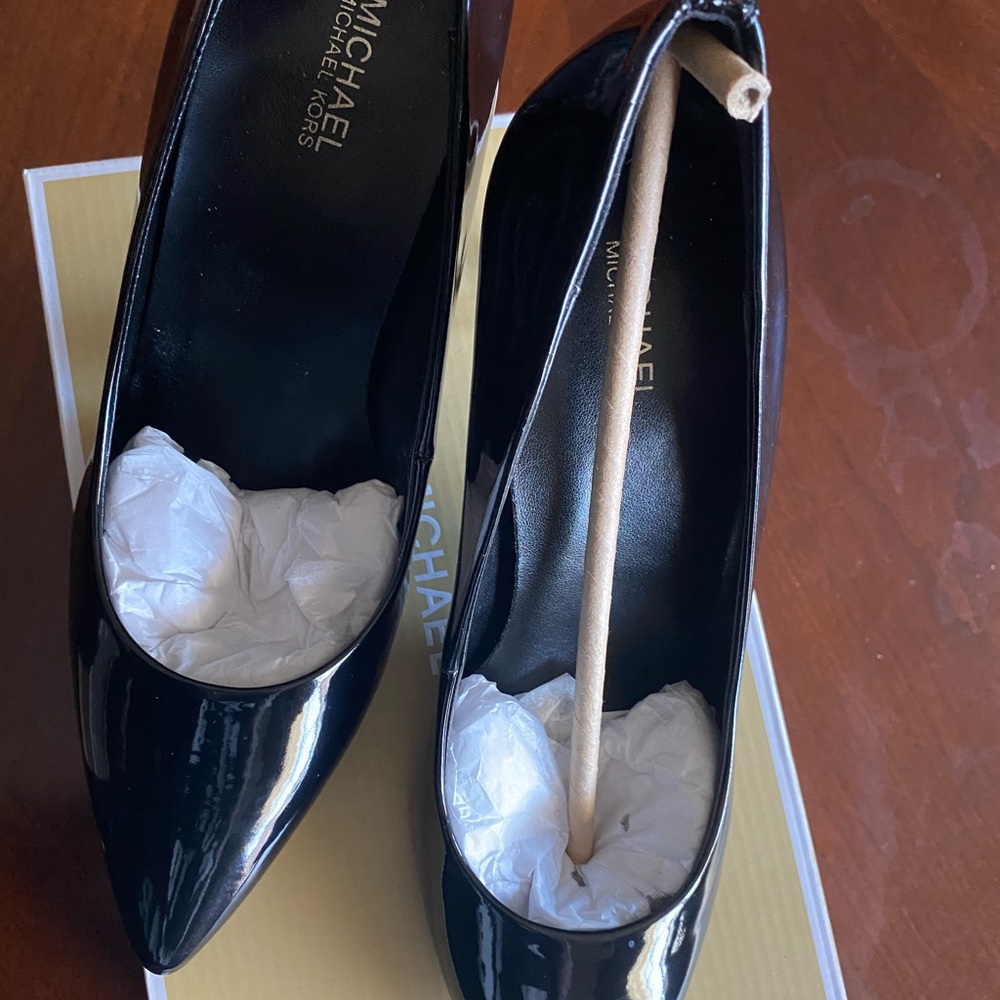 black patent leather MK pumps